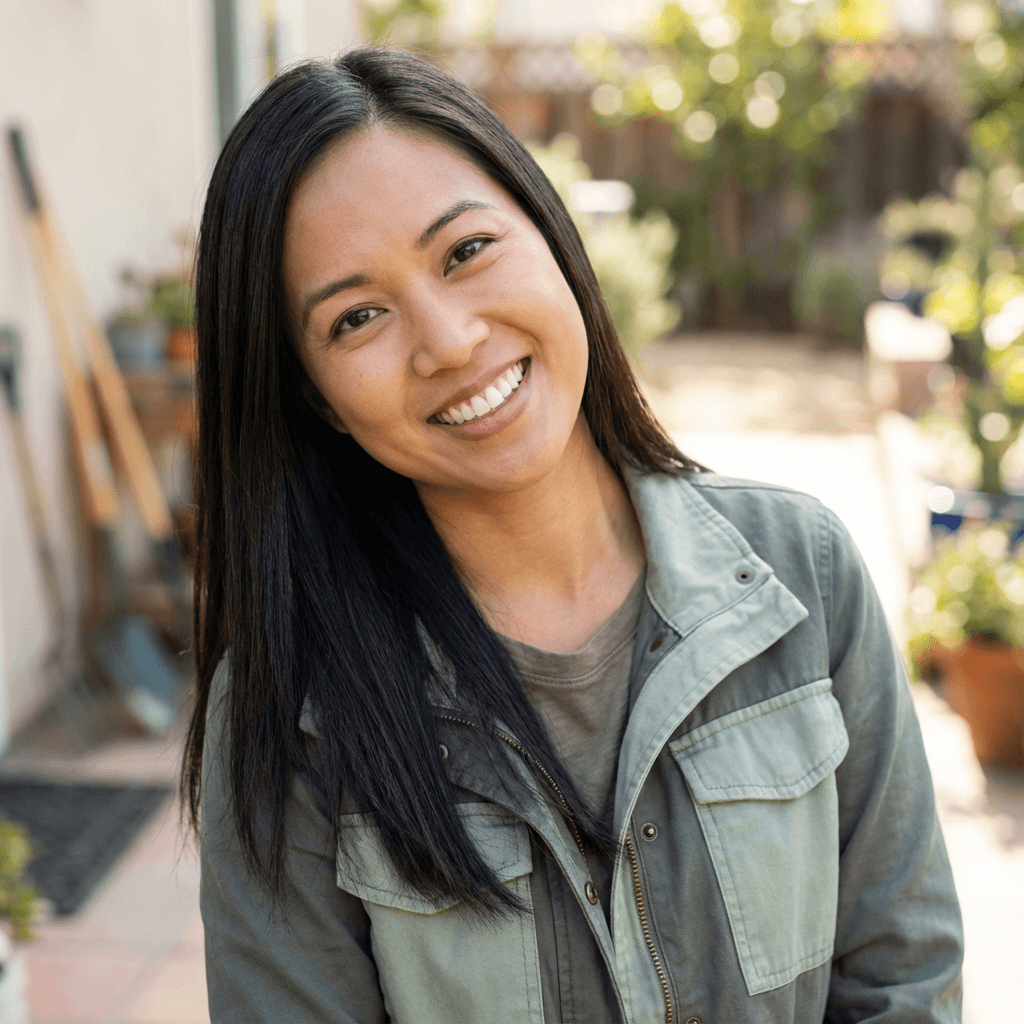 Emily Rodriguez smiling at a coffee table